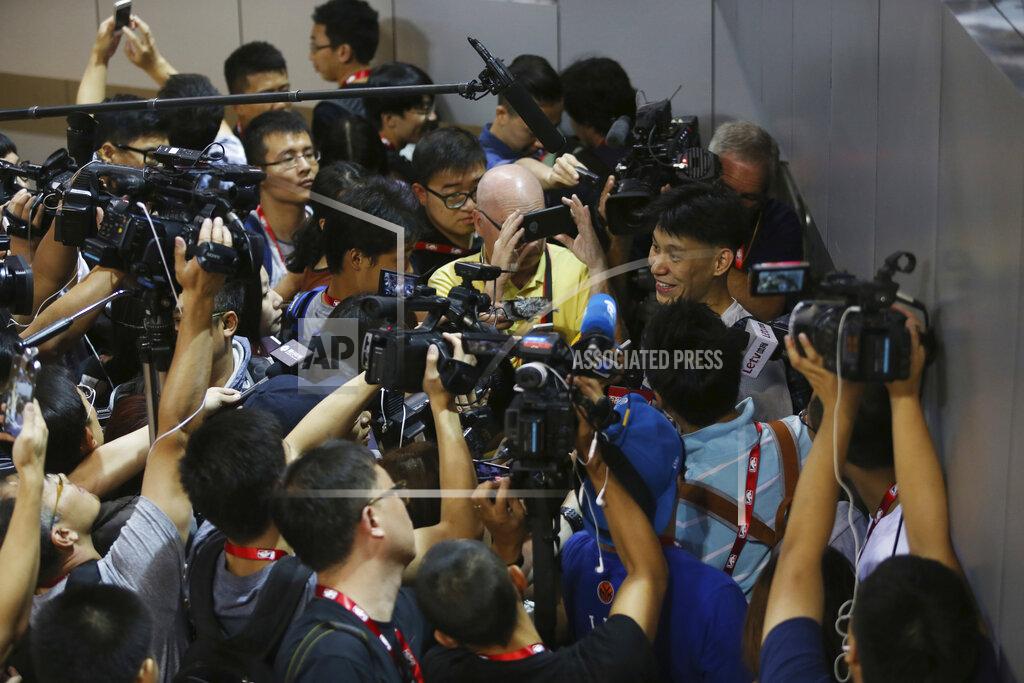 Kin Cheung FILE - In this Oct. 10, 2015, file photo, NBA basketball player Jeremy Lin of the Charlotte Hornets talks to media after a training session for the 2015 NBA Global Games in Shenzhen, China. As sports prepare to resume, journalists are facing the same reckoning that their colleagues who cover politics, education and entertainment have encountered — coming up with new approaches to coverage with reduced access and resources. Professional leagues closed media access to locker rooms and clubhouses in early March. (AP Photo/Kin Cheung, File)