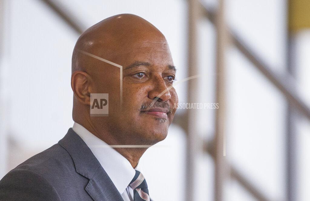 FILE - In this Oct. 3, 2019, file photo, Indiana Attorney General Curtis Hill holds a press conference in South Bend, Ind. Votes are being tallied Friday, July 10, 2020, to decide whether Republicans will nominate Attorney General Hill for a new term despite allegations of groping four women that resulted in a month-long suspension of his law license. (Robert Franklin/South Bend Tribune via AP, File)