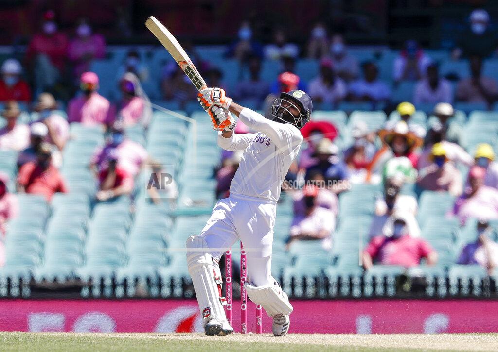 Rick Rycroft India's Ravindra Jadeja bats during play on day three of the third cricket test between India and Australia at the Sydney Cricket Ground, Sydney, Australia, Saturday, Jan. 9, 2021. (AP Photo/Rick Rycroft)