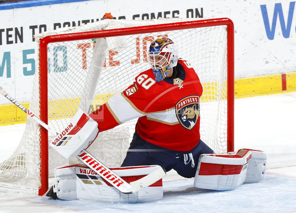 Florida Panthers goaltender Chris Driedger defends the net against the Carolina Hurricanes during the second period of an NHL hockey game Saturday, April 24, 2021, in Sunrise, Fla. (AP Photo/Joel Auerbach)