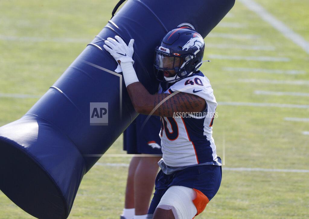 David Zalubowski Denver Broncos linebacker Justin Strnad takes part in drills during an NFL football practice at the team's headquarters Wednesday, Aug. 19, 2020, in Englewood, Colo. (AP Photo/David Zalubowski)