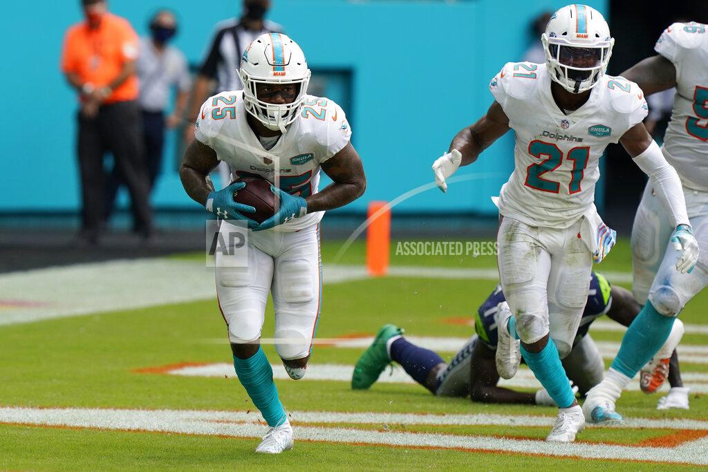 Wilfredo Lee Miami Dolphins cornerback Xavien Howard (25) intercepts a pass in the endzone, during the second half of an NFL football game, Sunday, Oct. 4, 2020 in Miami Gardens, Fla. The Seahawks defeated the Dolphins 31-23.(AP Photo/Wilfredo Lee)