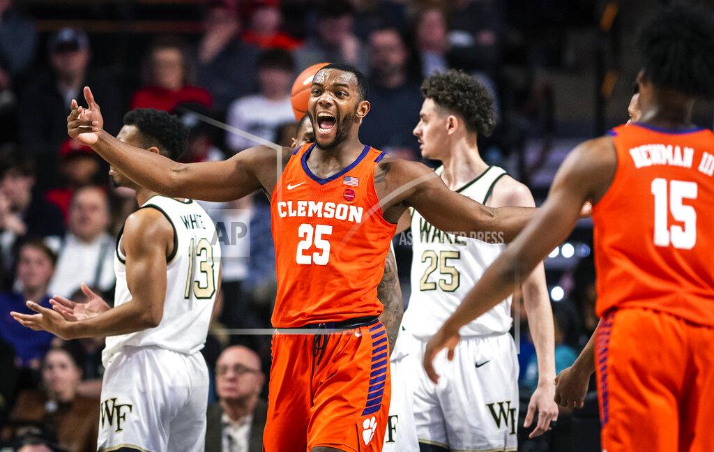 Andrew Dye Clemson forward Aamir Simms (25) celebrates after scoring a basket and drawing a foul during the team's NCAA college basketball game against Wake Forest on Saturday, Feb. 1, 2020, in Winston-Salem, N.C. (Andrew Dye/The Winston-Salem Journal via AP)