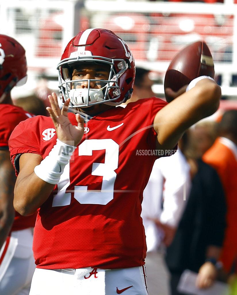 Butch Dill Alabama quarterback Tua Tagovailoa (13) warms up before an NCAA college football game against Auburn, Saturday, Nov. 24, 2018, in Tuscaloosa, Ala. (AP Photo/Butch Dill)