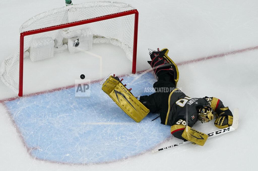 John Locher Vegas Golden Knights goaltender Marc-Andre Fleury (29) is scored on by Montreal Canadiens right wing Cole Caufield, not pictured, during the second period in Game 5 of an NHL hockey Stanley Cup semifinal playoff series Tuesday, June 22, 2021, in Las Vegas. (AP Photo/John Locher)