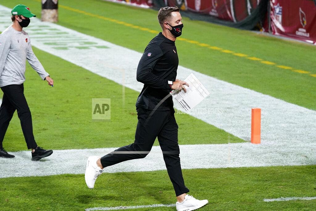 Ross D. Franklin Arizona Cardinals head coach Kliff Kingsbury leaves the field after an NFL football game against the Miami Dolphins, Sunday, Nov. 8, 2020, in Glendale, Ariz. The Dolphins won 34-31. (AP Photo/Ross D. Franklin)
