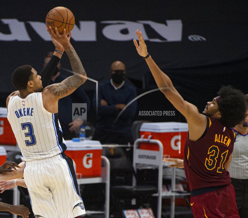 Phil Long Orlando Magic's Chuma Okeke shoots over Cleveland Cavaliers' Jarrett Allen during the third quarter of an NBA basketball game Wednesday, April 28, 2021 in Cleveland. (AP Photo/Phil Long)