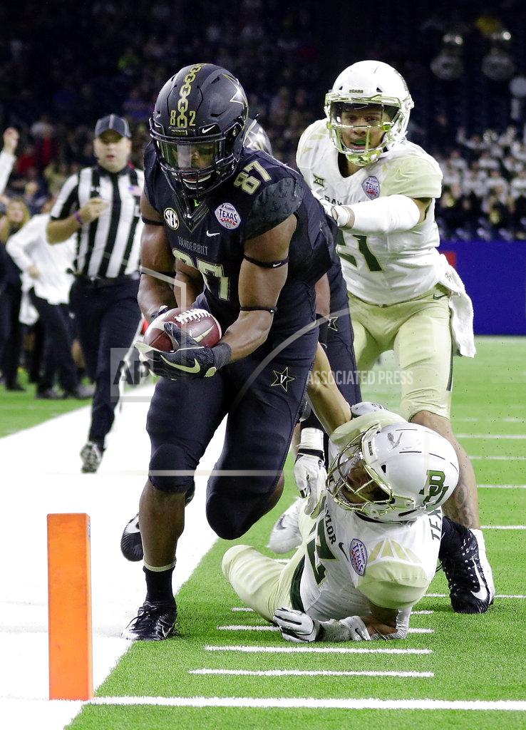 Michael Wyke Vanderbilt wide receiver Amir Abdur-Rahman (87) steps out of bounds 2-yards from the end zone as Baylor cornerback Raleigh Texada, bottom right, pulls him down on the tackle during the second half of the Texas Bowl NCAA college football game, Thursday, Dec. 27, 2018, in Houston. (AP Photo/Michael Wyke)