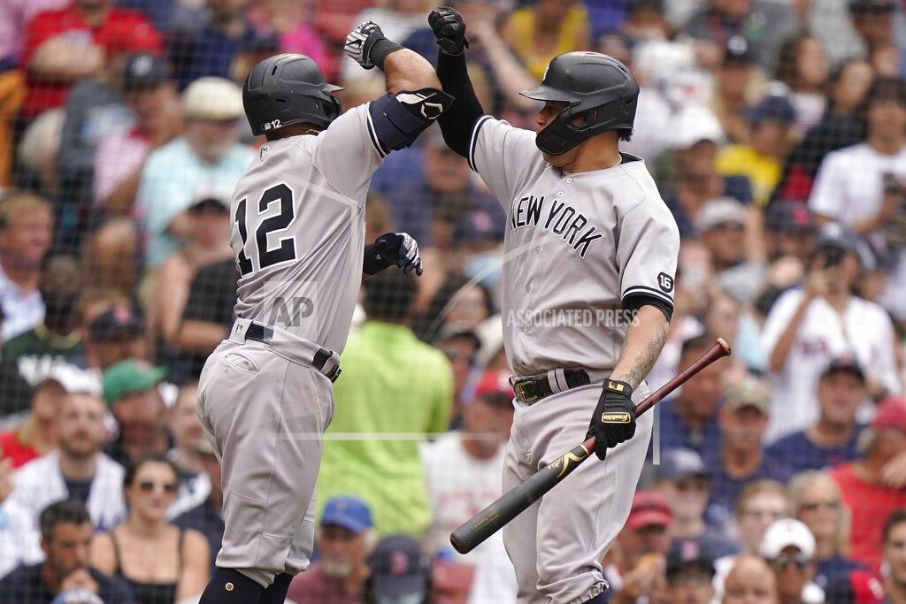 Steven Senne New York Yankees' Rougned Odor, left, celebrates his home run with Gary Sanchez, right, as he arrives a home plate in the sixth inning of a baseball game against the Boston Red Sox, Sunday, July 25, 2021, in Boston. (AP Photo/Steven Senne)