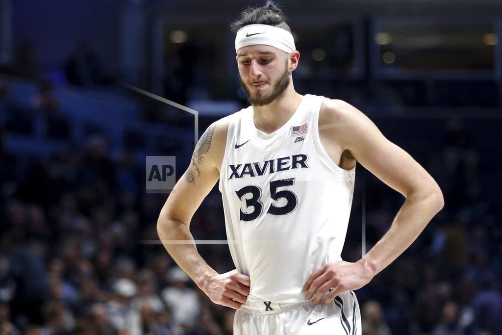 John Minchillo Xavier's Zach Hankins reacts during the second half of the team's NCAA college basketball game against Seton Hall, Wednesday, Jan. 2, 2019, in Cincinnati. (AP Photo/John Minchillo)