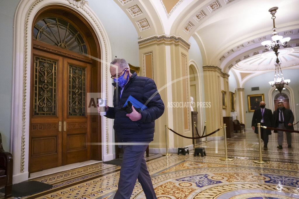 J. Scott Applewhite Senate Majority Leader Chuck Schumer, D-N.Y., arrives for work as the second impeachment trial of former President Donald Trump begins today in the Senate, at the Capitol in Washington, Tuesday, Feb. 9, 2021. (AP Photo/J. Scott Applewhite)