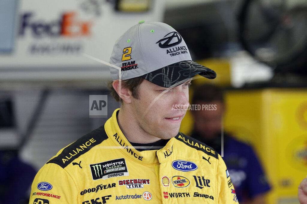 Gerry Broome Brad Keselowski waits in the garage to practice for Sunday's NASCAR Cup Series auto race at Charlotte Motor Speedway in Concord, N.C., Saturday, Sept. 28, 2019. (AP Photo/Gerry Broome)