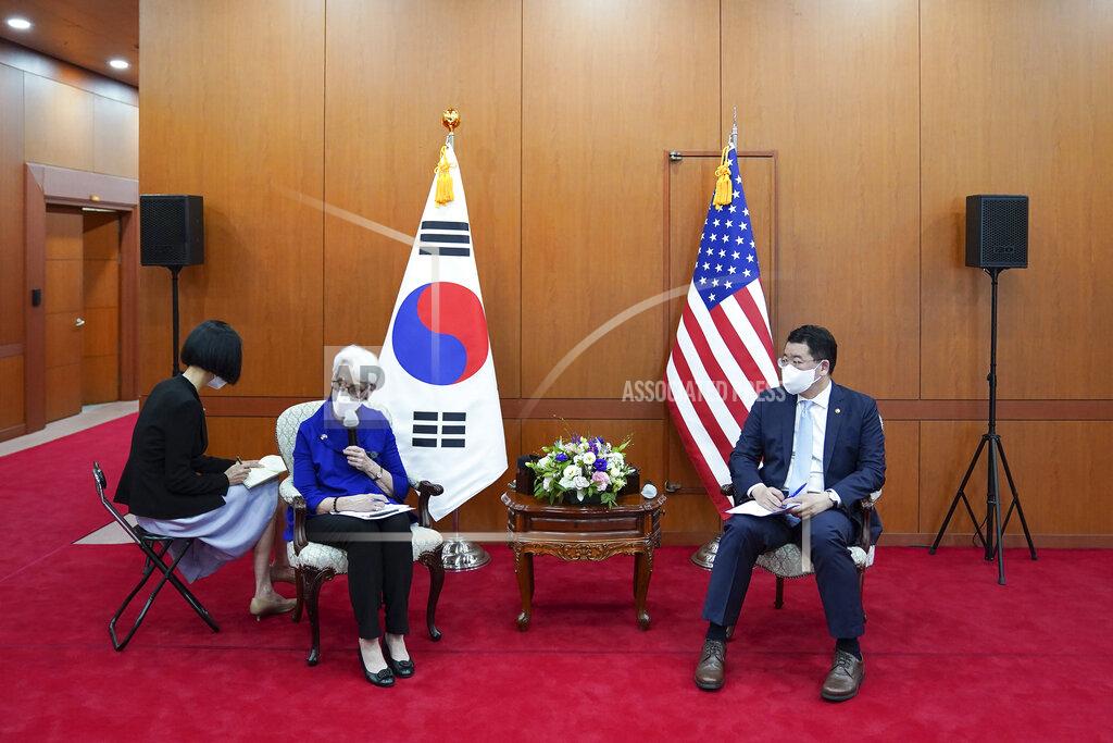 Uncredited In this photo provided by South Korea Foreign Ministry, U.S. Deputy Secretary of State Wendy Sherman, second from left, talks to journalists as South Korean First Vice Foreign Minister Choi Jong Kun listens after their meeting at the Foreign Ministry in Seoul, South Korea, Friday, July 23, 2021. America's No. 2 diplomat on Friday expressed sympathy for North Koreans facing hardships and food shortages linked to the pandemic, and renewed calls for the North to return to talks over its nuclear program. (South Korea Foreign Ministry via AP)