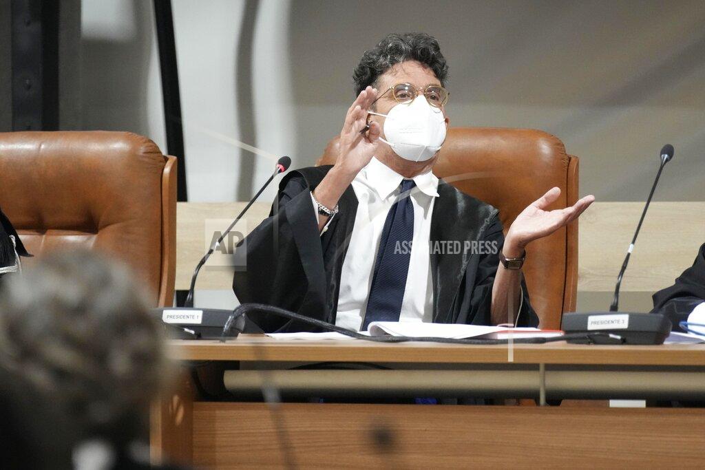 Antonio Calanni Judge Paolo Lepri gestures during the first hearing of the trial for the Morandi bridge collapse at the Genoa's Palace of Justice Thursday, July 7, 2022. Forty-three people were killed when a large stretch of the Morandi Bridge broke off, August 14, 2018, on the eve of one of Italy's biggest vacation holidays. (AP Photo/Antonio Calanni)