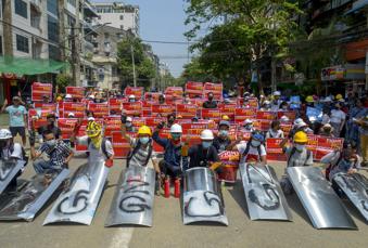 Some Myanmar protests escape violence, but tensions remain Some Myanmar protests escape violence, but tensions remain