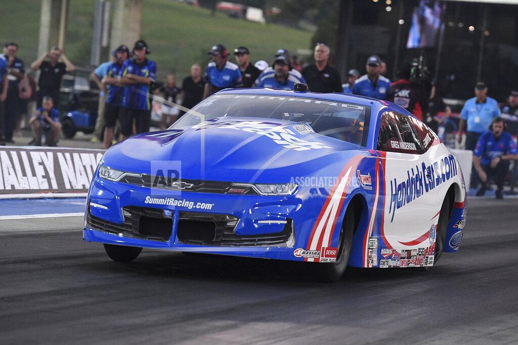 Jerry Fos In this photo provided by the NHRA, Greg Anderson drives in Pro Stock qualifying at Bristol Dragway on Friday, June 17, 2022, during the NHRA Thunder Valley Nationals drag races in Bristol, Tenn. (Jerry Foss/NHRA via AP)