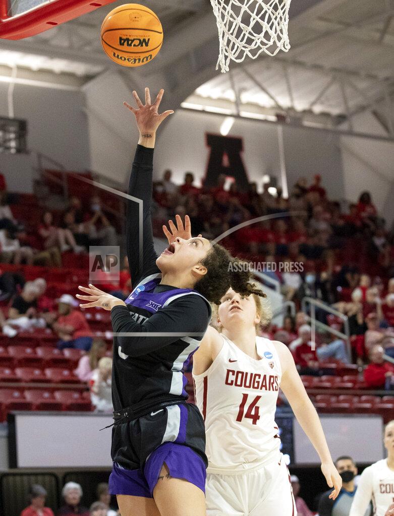 Ben Mckeown Kansas State's Brylee Glenn (5) attempts a shot in front of Washington State's Jessica Clarke (14) during the first half of a college basketball game in the first round of the NCAA tournament in Raleigh, N.C., Saturday, March 19, 2022. (AP Photo/Ben McKeown)