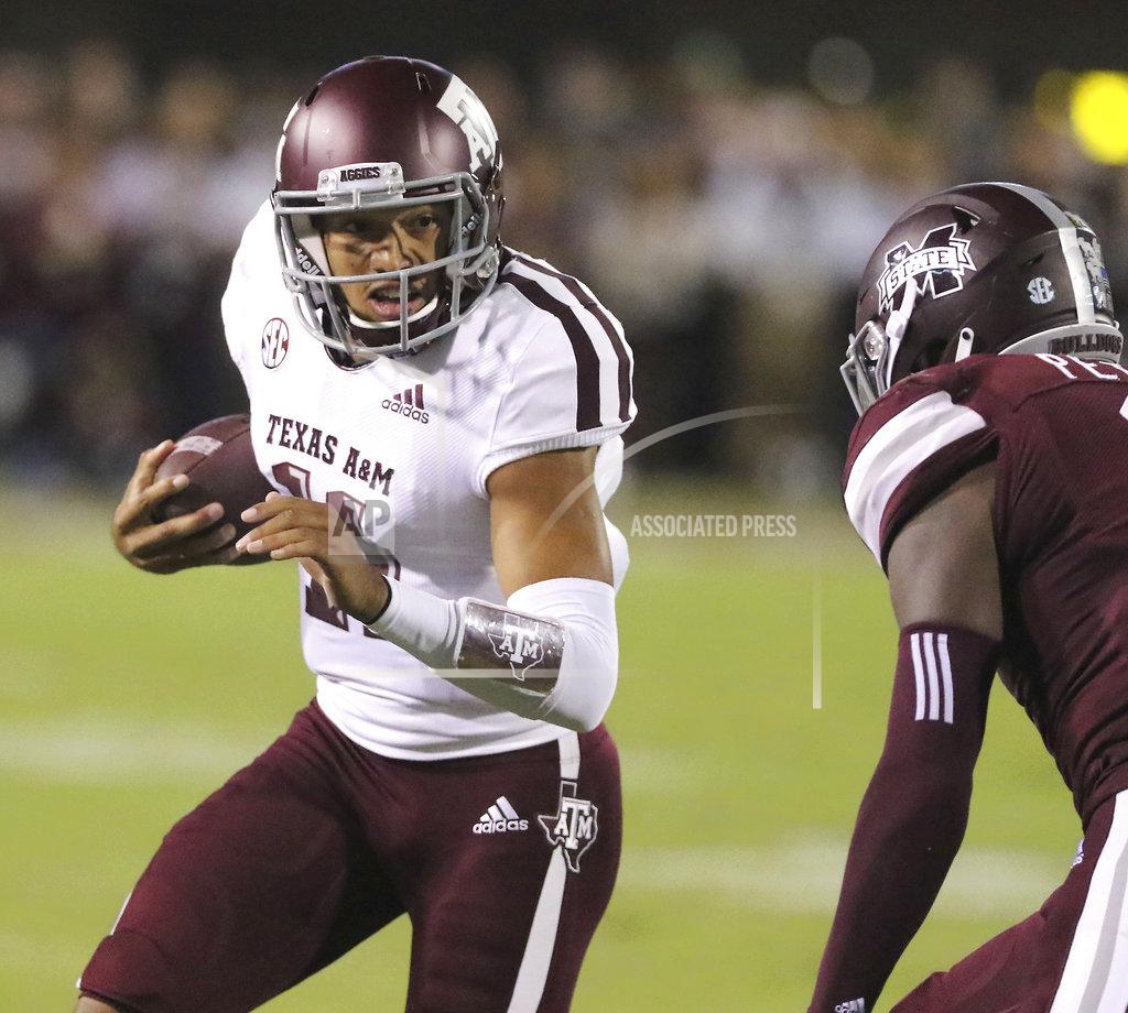 Jim Lytle Texas A&M quarterback Kellen Mond (11) sprints for additional yardage while trying to avoid the tackle by Mississippi State cornerback Jamal Peters (2) during the first half of their NCAA college football game on Saturday, Oct. 27, 2018, in Starkville, Miss. (AP Photo/Jim Lytle)