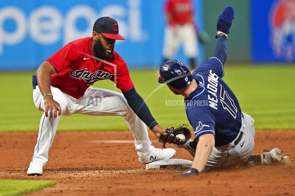 Tony Dejak Cleveland Indians' Amed Rosario, left, tags out Tampa Bay Rays' Austin Meadows at second base on a steal attempt during the sixth inning of a baseball game Thursday, July 22, 2021, in Cleveland. (AP Photo/Tony Dejak)
