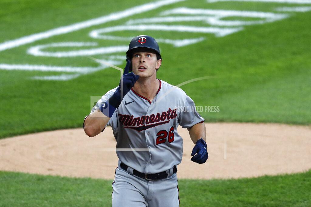 Charles Rex Arbogast Minnesota Twins' Max Kepler celebrates his second home run off Chicago White Sox starting pitcher Lucas Giolito, during the second inning of a baseball game Friday, July 24, 2020, in Chicago. (AP Photo/Charles Rex Arbogast)