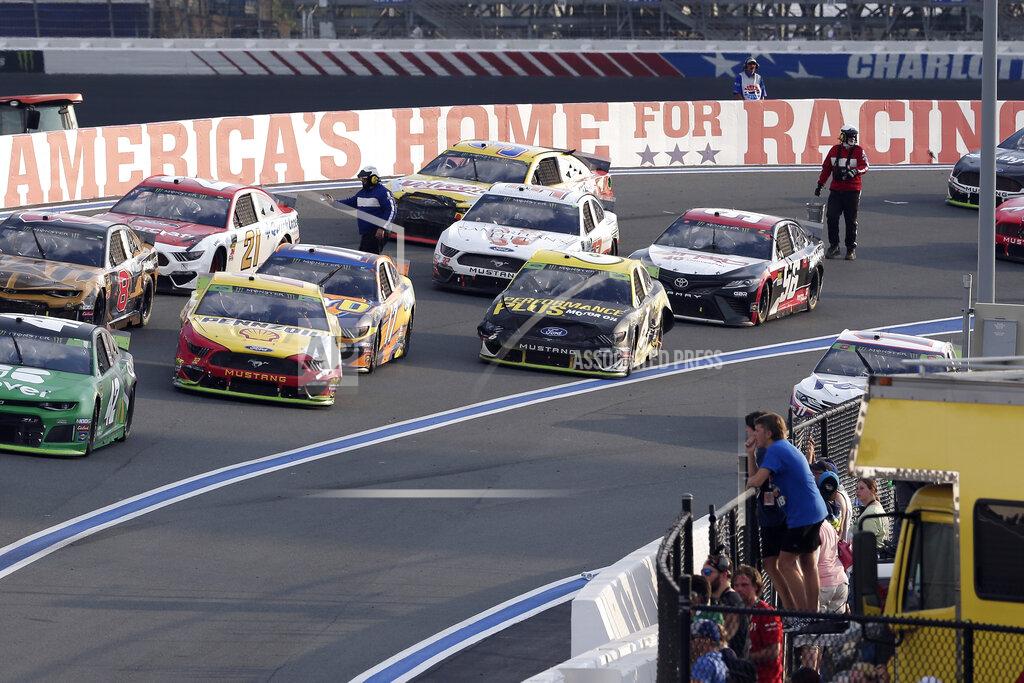 Gerry Broome Officials pass out water to drivers during a red flag late in the NASCAR Cup Series auto race at Charlotte Motor Speedway in Concord, N.C., Sunday, Sept. 29, 2019. (AP Photo/Gerry Broome)