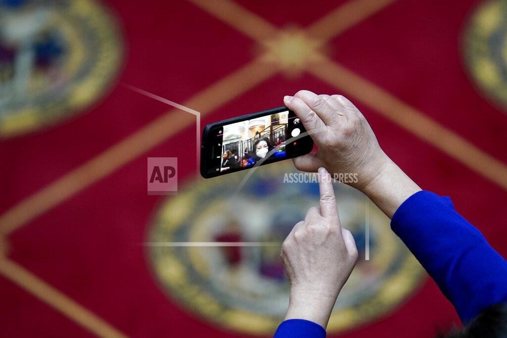 Julio Cortez State Sen. Susan Lee, D-Montgomery County, takes a selfie in the Senate chamber prior to the first day of the state's 2021 legislative session, Wednesday, Jan. 13, 2021, in Annapolis, Md. (AP Photo/Julio Cortez)