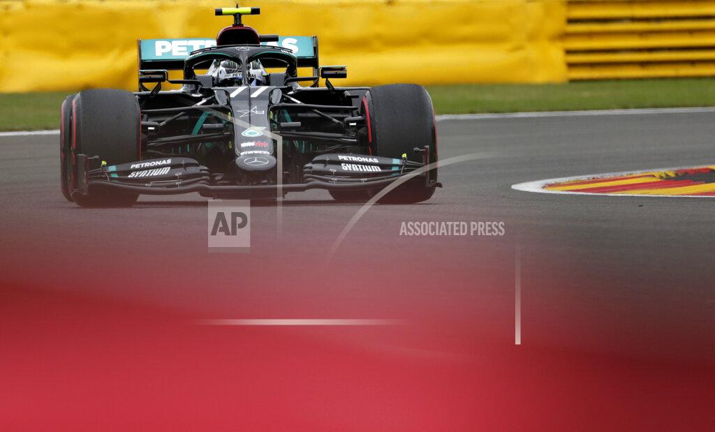 Stephanie Lecocq Mercedes driver Valtteri Bottas of Finland steers his car during the first practice session prior to the Formula One Grand Prix at the Spa-Francorchamps racetrack in Spa, Belgium Friday, Aug. 28, 2020. (Stephanie Lecocq, Pool via AP)