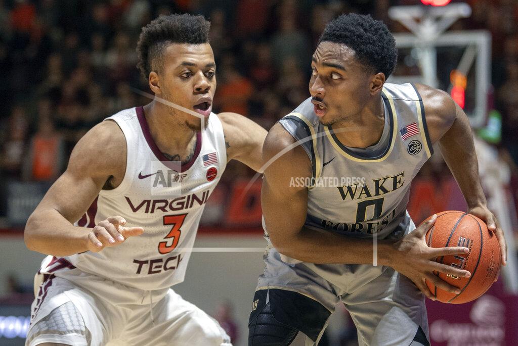 Don Petersen Wake Forest guard Brandon Childress (0) looks to pass against Virginia Tech guard Wabissa Bede (3) during the first half of an NCAA college basketball game Saturday, Jan. 19, 2019, in Blacksburg, Va. (AP Photo/Don Petersen)