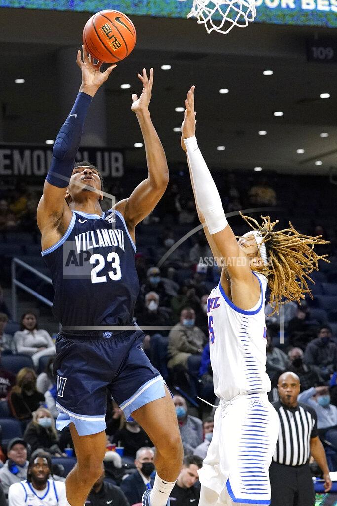 Nam Y. Huh Villanova forward Jermaine Samuels, left, shoots against DePaul forward Brandon Johnson during the first half of an NCAA college basketball game in Chicago, Saturday, Jan. 8, 2022. (AP Photo/Nam Y. Huh)