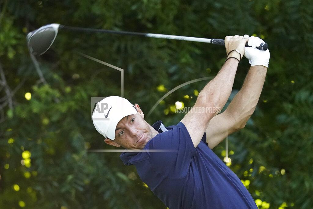 David J. Phillip Rory McIlroy, of Northern Ireland, tees off on the sixth hole during practice for the Charles Schwab Challenge golf tournament at the Colonial Country Club in Fort Worth, Texas, Wednesday, June 10, 2020. (AP Photo/David J. Phillip)