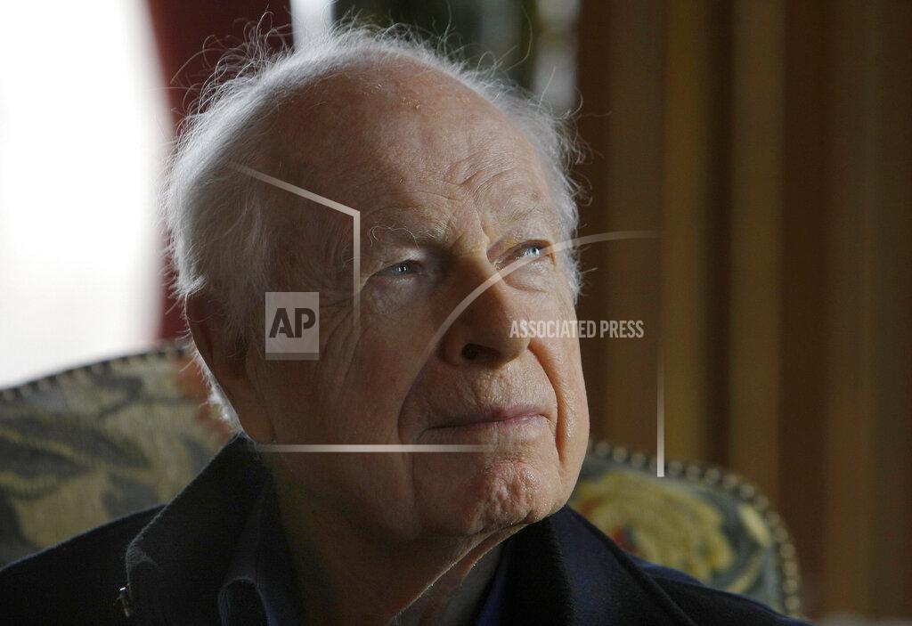 Jacques Brinon FILE - British theatre director Peter Brook, is photographed, during a reception after being awarded the Great Vermeil medal of Paris, at the city hall Paris, Tuesday, Jan. 25, 2011. Brook, a British theater director known for an influential and distinguished career which saw him garner worldwide acclaim, has died. He was 97. The two-time Tony Award winner, who had settled in France since the 1970s, also directed the film adaptations of his best stage works as well as the 1963 release of “Lord of the Flies”. (AP Photo/Jacques Brinon, File )