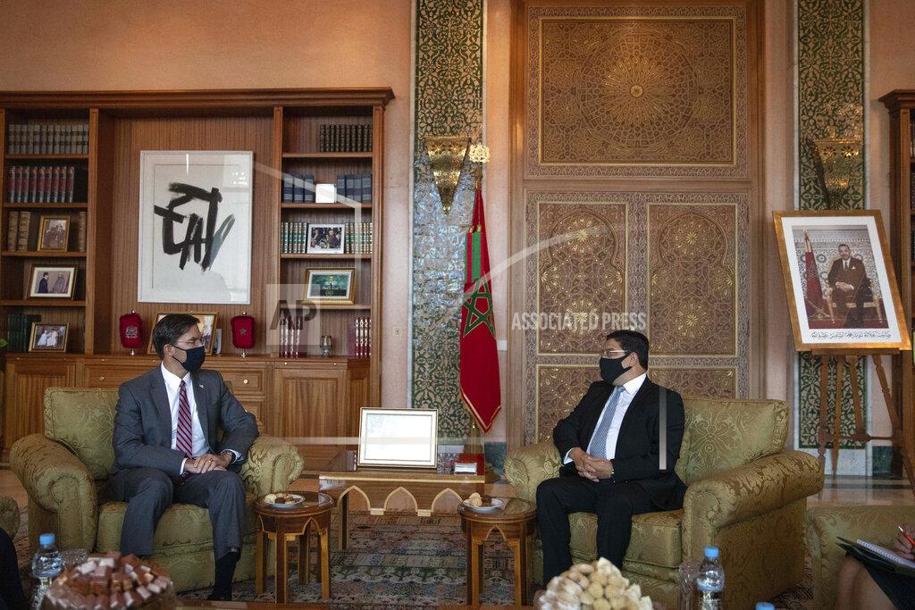 Mosa'ab Elshamy US Secretary of Defense Mark Esper, left, conducts talks with Moroccan Foreign Minister Nasser Bourita, right, in Rabat, Morocco, Friday, Oct. 2, 2020. The visit is part of US Defense Secretary Mark Esper's North Africa tour and is his first visit to Africa as defense secretary. (AP Photo/Mosa'ab Elshamy)