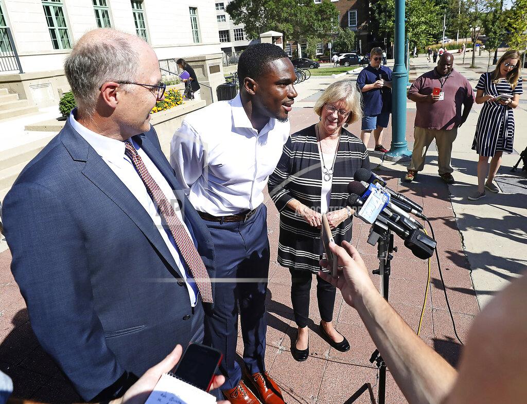John Hart Wisconsin Badger football player Quintez Cephus speaks during a press conference outside the Madison Municipal Building addressing his reinstatement to the university in Madison, Wis. Monday, Aug. 19, 2019. He is pictured with his attorneys, Stephen Meyer and Kathleen Stilling. The university expelled Cephus last semester for violating the non-academic misconduct code following accusations of sexual assault from two women. A Dane County jury acquitted him of those charges earlier this month after deliberating for less than an hour. (John Hart/Wisconsin State Journal via AP)