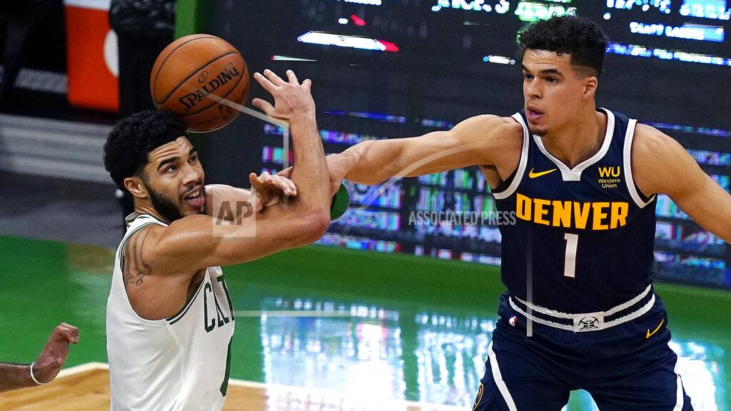 Charles Krupa Denver Nuggets forward Michael Porter Jr. (1) knocks the ball from the hands of Boston Celtics forward Jayson Tatum, left, during the first half of an NBA basketball game Tuesday, Feb. 16, 2021, in Boston. (AP Photo/Charles Krupa)