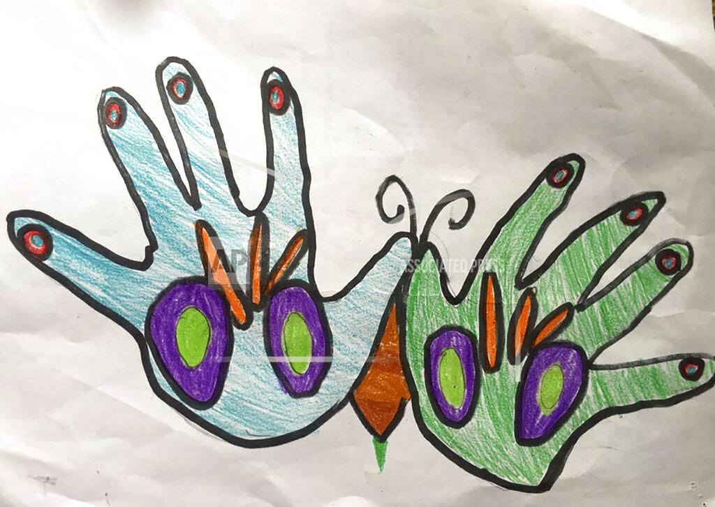 Advait Vallabh Sanweris This Wednesday, April 29, 2020 photo shows a painting made by Advait Vallabh Sanweria of New Delhi, India, during a nationwide COVID-19 coronavirus lockdown. Excited to see a rainbow arching across blue skies outside their home, the 9-year old says, “The weather has changed so much,” noting the visibly fresh air in the capital, as air quality in the otherwise choked city has improved drastically during the lockdown. (Advait Vallabh Sanweria via AP)