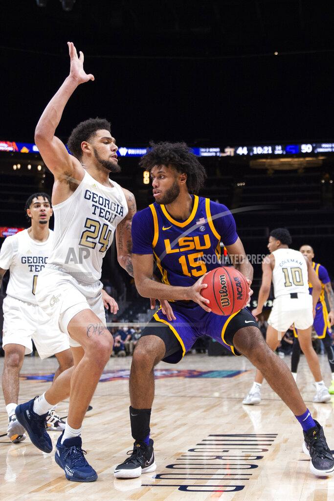 Hakim Wright Sr. Georgia Tech center Rodney Howard (24) defends against LSU center Efton Reid (15) during the second half of an NCAA college basketball game Saturday, Dec. 11, 2021, in Atlanta. (AP Photo/Hakim Wright Sr.)