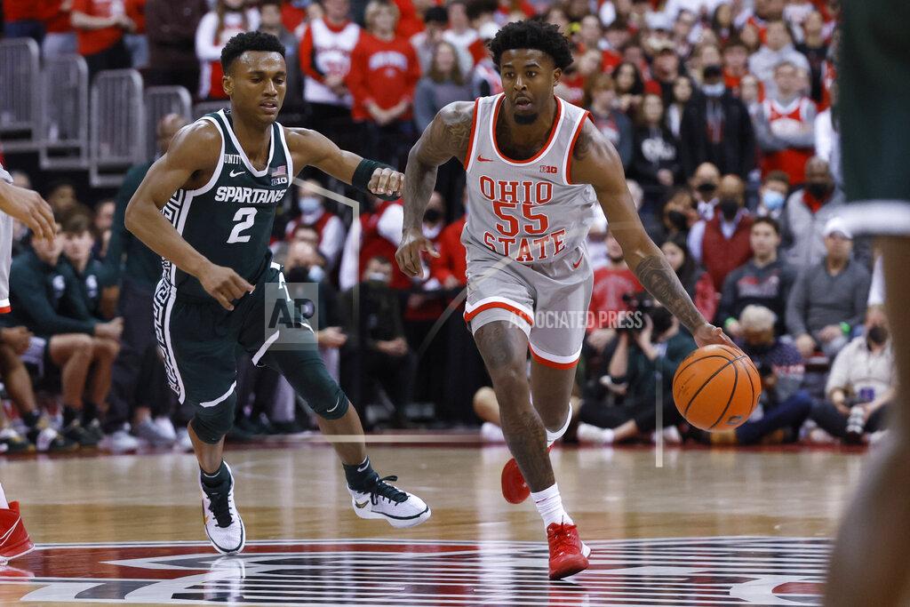 Jay Laprete Ohio State's Jamari Wheeler, right, brings the ball up as Michigan State's Tyson Walker defends during the second half of an NCAA college basketball game Thursday, March 3, 2022, in Columbus, Ohio. (AP Photo/Jay LaPrete)