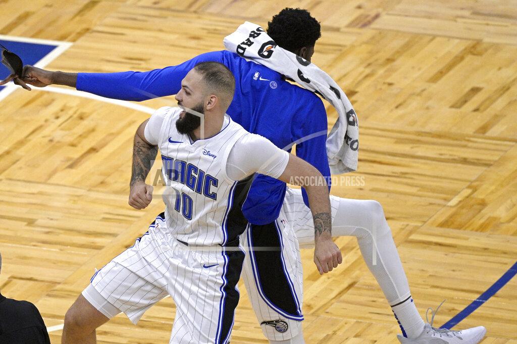 Phelan M. Ebenhack Orlando Magic guard Evan Fournier (10) celebrates with center Mo Bamba after making a 3-point basket during the second half of the team's NBA basketball game against the New York Knicks, Wednesday, Feb. 17, 2021, in Orlando, Fla. (AP Photo/Phelan M. Ebenhack)