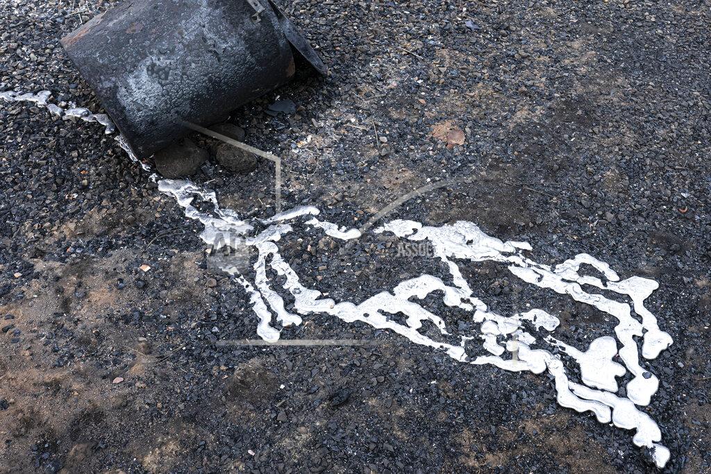 Nathan Howard Melted metal is seen near a home destroyed by the Bootleg Fire on Wednesday, July 21, 2021 near Bly, Ore. (AP Photo/Nathan Howard)