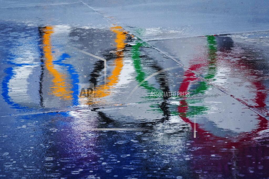 Ben Curtis The Olympic rings are seen reflected in water at the BMX Freestyle course after a training session was cancelled due to rain, at the 2020 Summer Olympics, Tuesday, July 27, 2021, in Tokyo, Japan. (AP Photo/Ben Curtis)