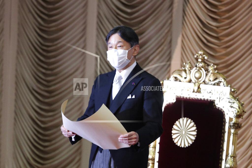Koji Sasahara Japan's Emperor Naruhito wearing a face mask to protect against the coronavirus reads a statement to formally open an extraordinary Diet session at the upper house of parliament in Tokyo, Monday, Oct. 26, 2020. (AP Photo/Koji Sasahara)