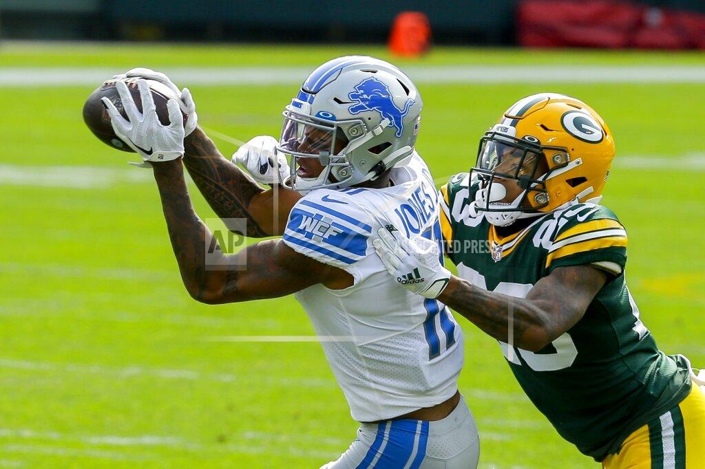 Mike Roemer Detroit Lions' Marvin Jones catches a pass with Green Bay Packers' Jaire Alexander defending during the first half of an NFL football game Sunday, Sept. 20, 2020, in Green Bay, Wis. (AP Photo/Mike Roemer)