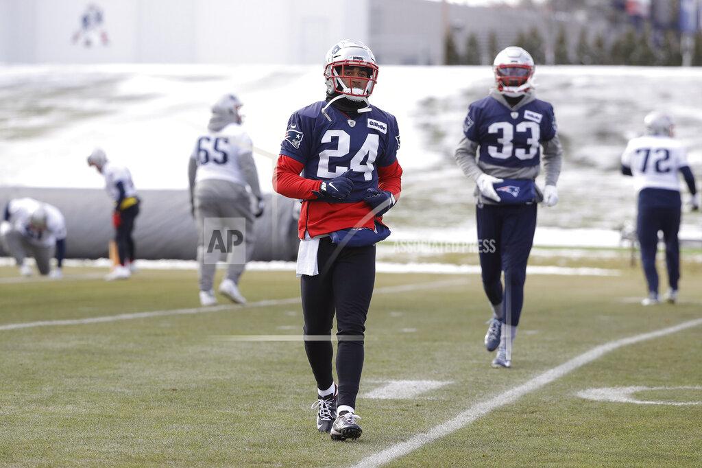 Steven Senne New England Patriots cornerbacks Stephon Gilmore (24) and Joejuan Williams (33) warm up during an NFL football practice, Wednesday, Dec. 18, 2019, in Foxborough, Mass. (AP Photo/Steven Senne)