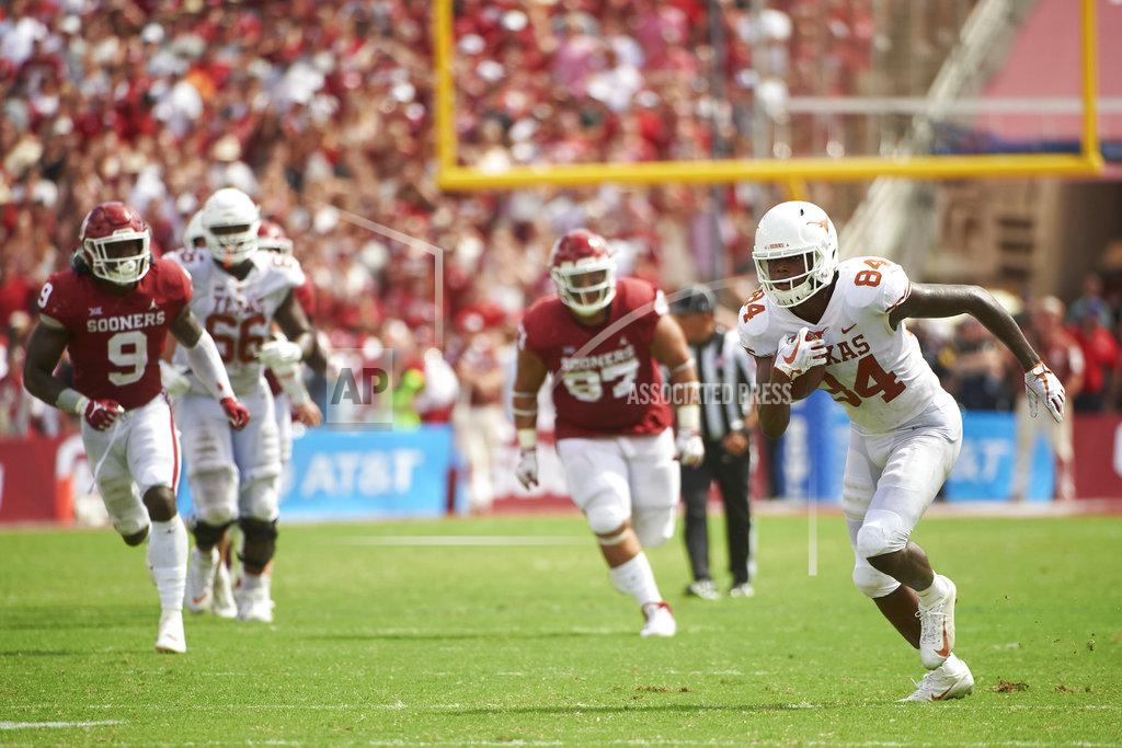 Cooper Neill Texas wide receiver Lil'Jordan Humphrey (84) breaks free against Oklahoma during the second half of an NCAA college football game at the Cotton Bowl, Saturday, Oct. 6, 2018, in Dallas. (AP Photo/Cooper Neill)