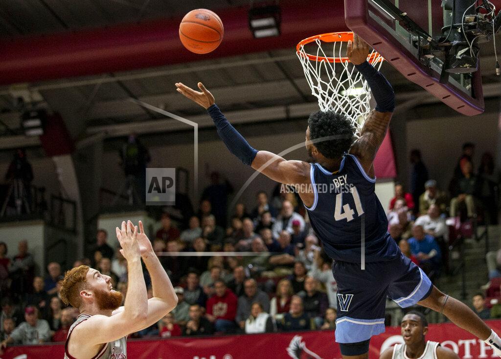 Laurence Kesterson Villanova forward Saddiq Bey (41) and Saint Joseph's forward Anthony Longpre (12) reach for a rebound during the second half of an NCAA college basketball game, Saturday, Dec. 7, 2019, in Philadelphia. Villanova won 78-66. (AP Photo/Laurence Kesterson)