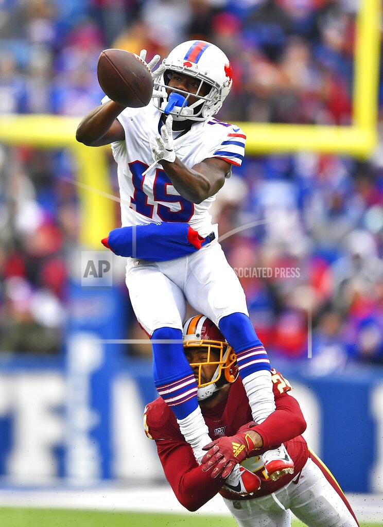 Adrian Kraus Buffalo Bills wide receiver John Brown (15) cannot hold onto the ball as Washington Redskins cornerback Josh Norman, bottom, defends during the second half of an NFL football game Sunday, Nov. 3, 2019, in Orchard Park, N.Y. (AP Photo/Adrian Kraus)