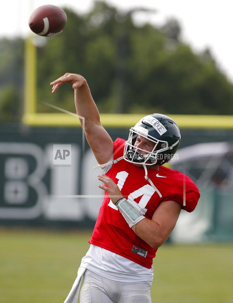 Al Goldis Michigan State quarterback Brian Lewerke throws a pass during an NCAA college football practice, Monday, Aug. 12, 2019, in East Lansing, Mich. (AP Photo/Al Goldis)