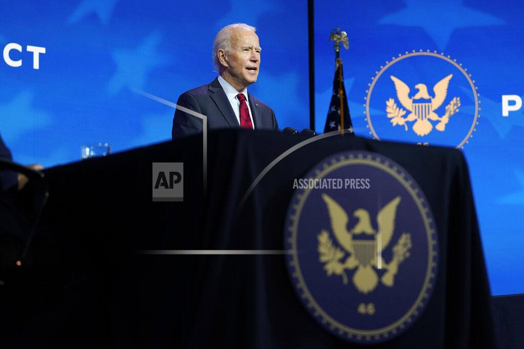 Susan Walsh President-elect Joe Biden speaks during an event at The Queen theater in Wilmington, Del., Tuesday, Dec. 8, 2020, to announce his health care team. (AP Photo/Susan Walsh)