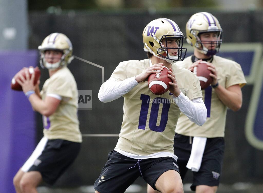 Ted S. Warren Washington quarterback Jacob Eason (10) drops to pass during the first day of spring NCAA college football practice, Wednesday, April 3, 2019, in Seattle. (AP Photo/Ted S. Warren)