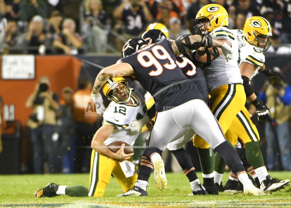 David Banks Green Bay Packers' Aaron Rodgers is hit by Chicago Bears' Aaron Lynch during the second half of an NFL football game Thursday, Sept. 5, 2019, in Chicago. (AP Photo/David Banks)